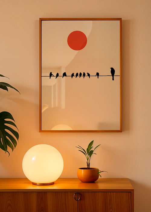 Design minimalista com pássaros no fio e sol vermelho