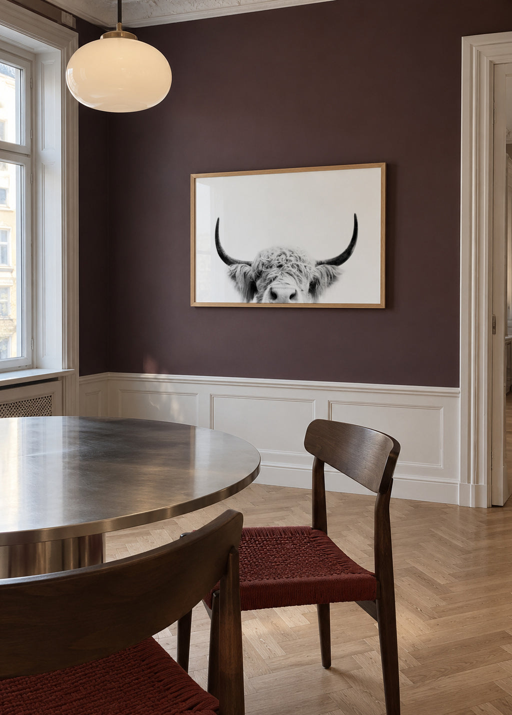 Peeking cow BW - Framed poster in an interior