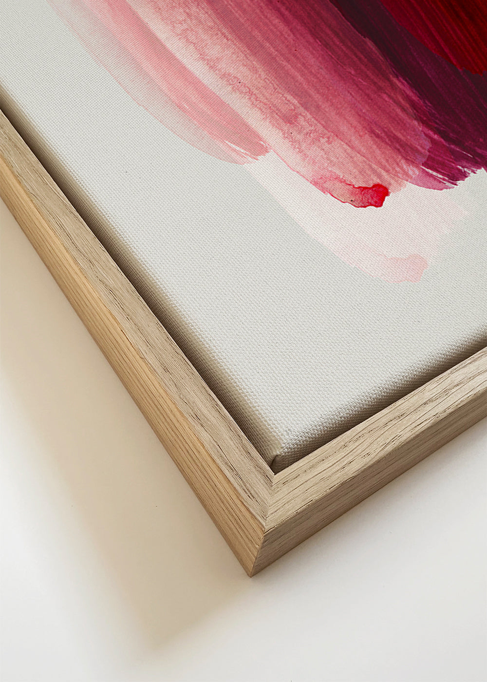 Quadro abstrato com pinceladas rosa e laranja