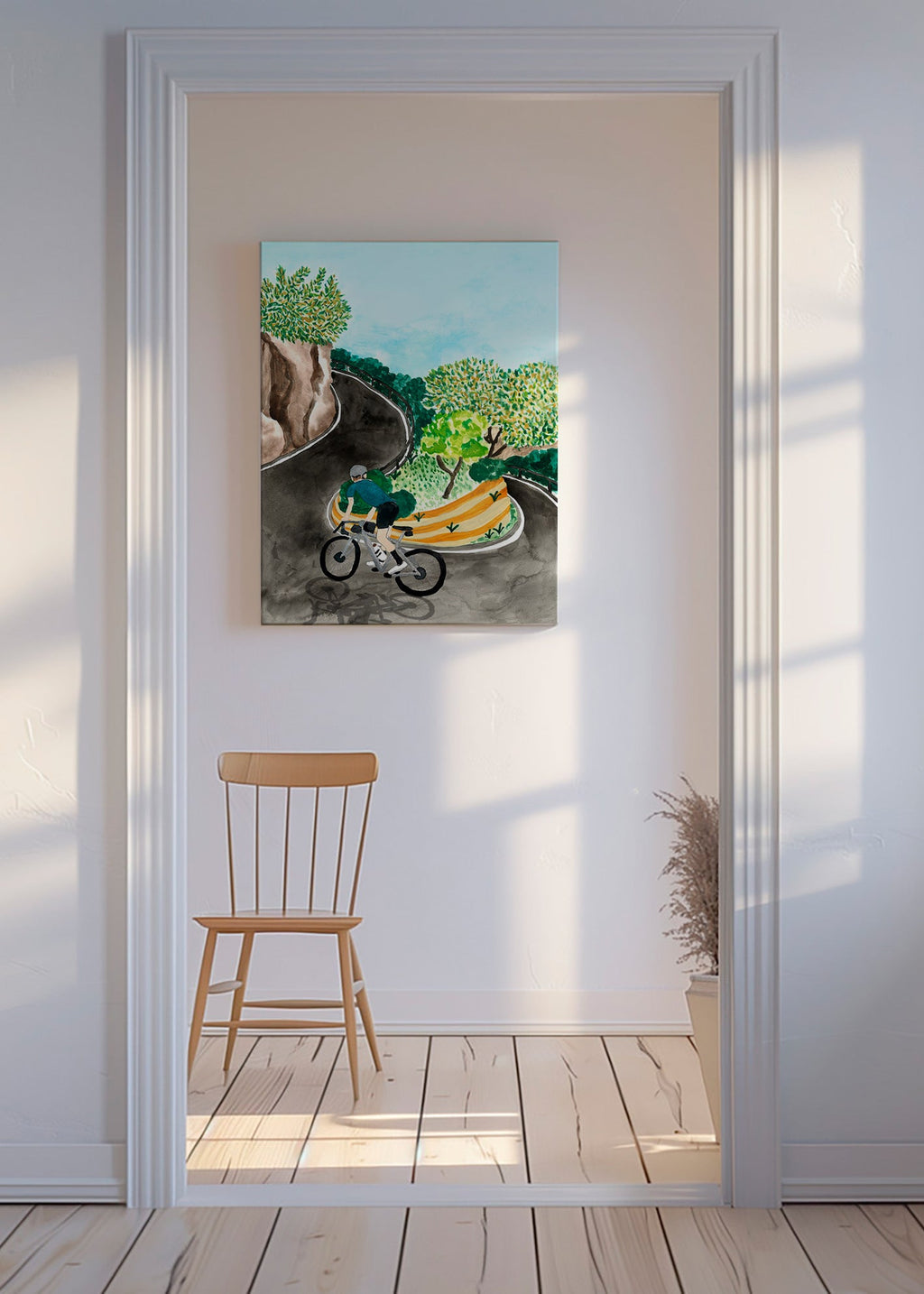Quadro de paisagem com ciclista em curva montanhosa