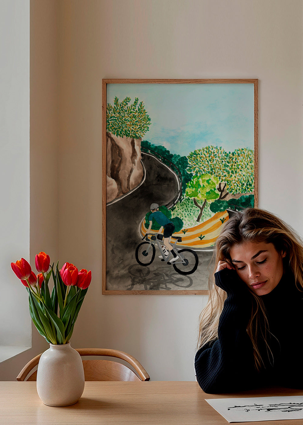 Quadro de paisagem com ciclista em curva montanhosa