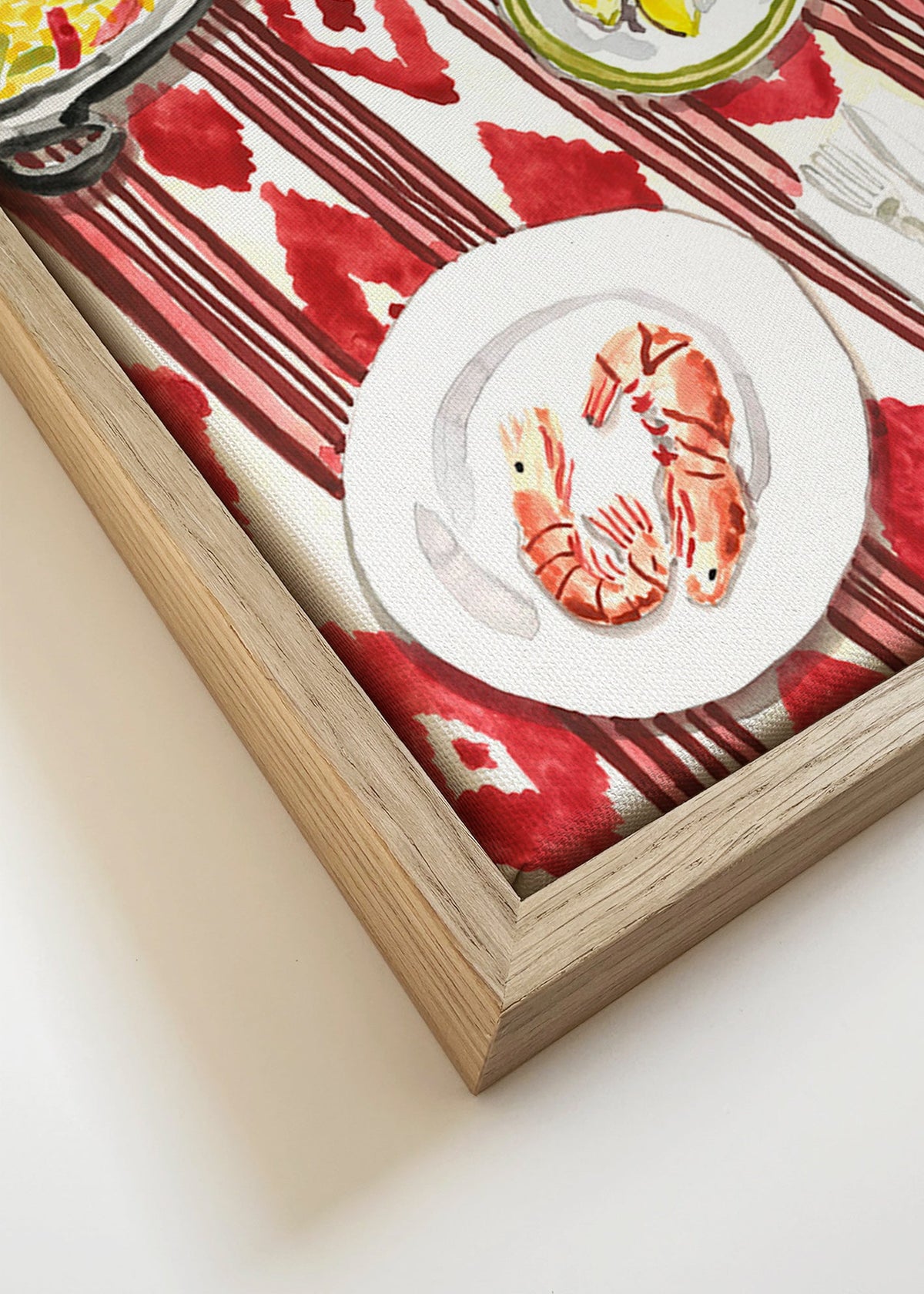 Arte para cozinha: paella e camarões sobre toalha estampada