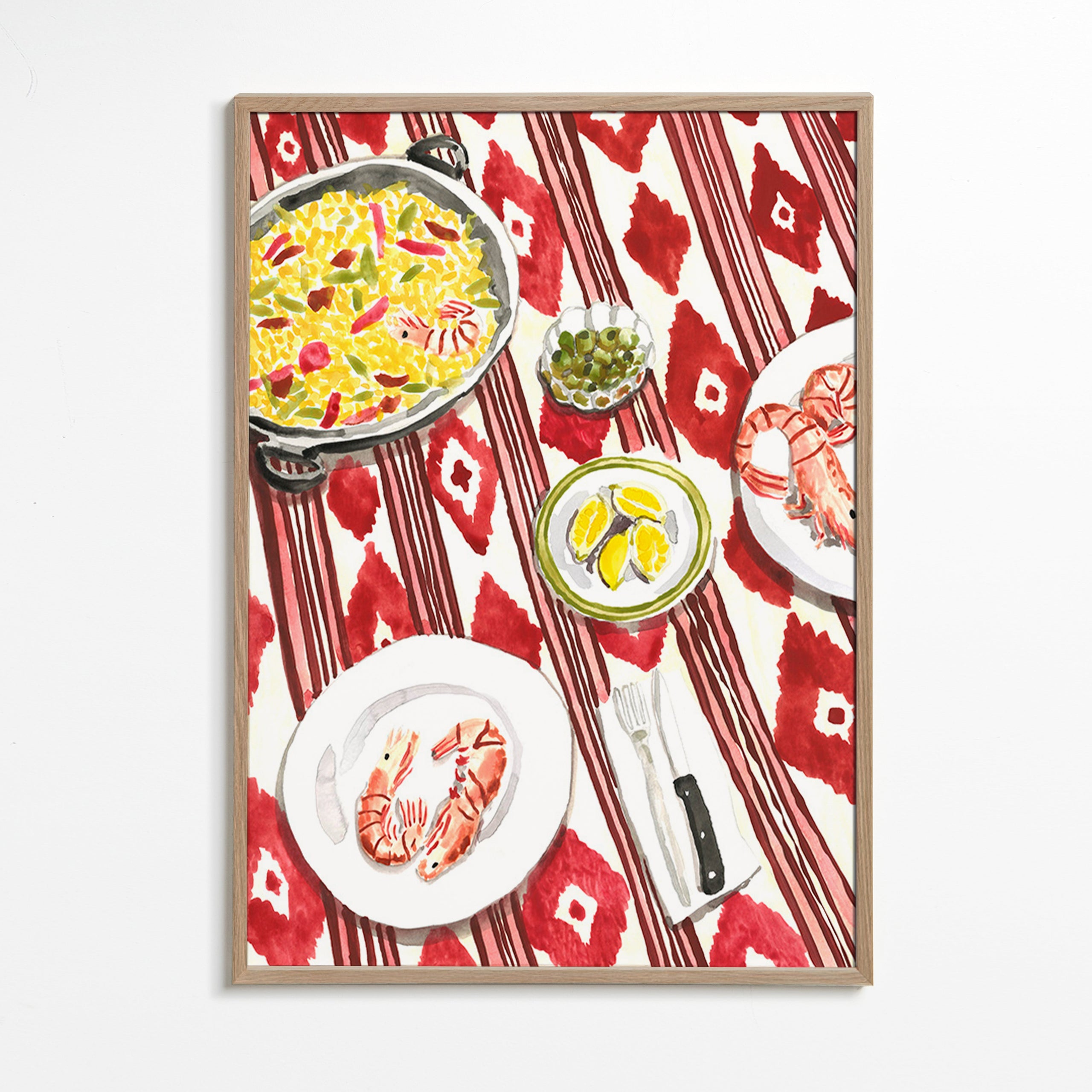 Arte para cozinha: paella e camarões sobre toalha estampada