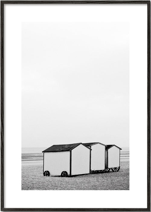 Quadro de paisagem preto e branco com cabanas de praia