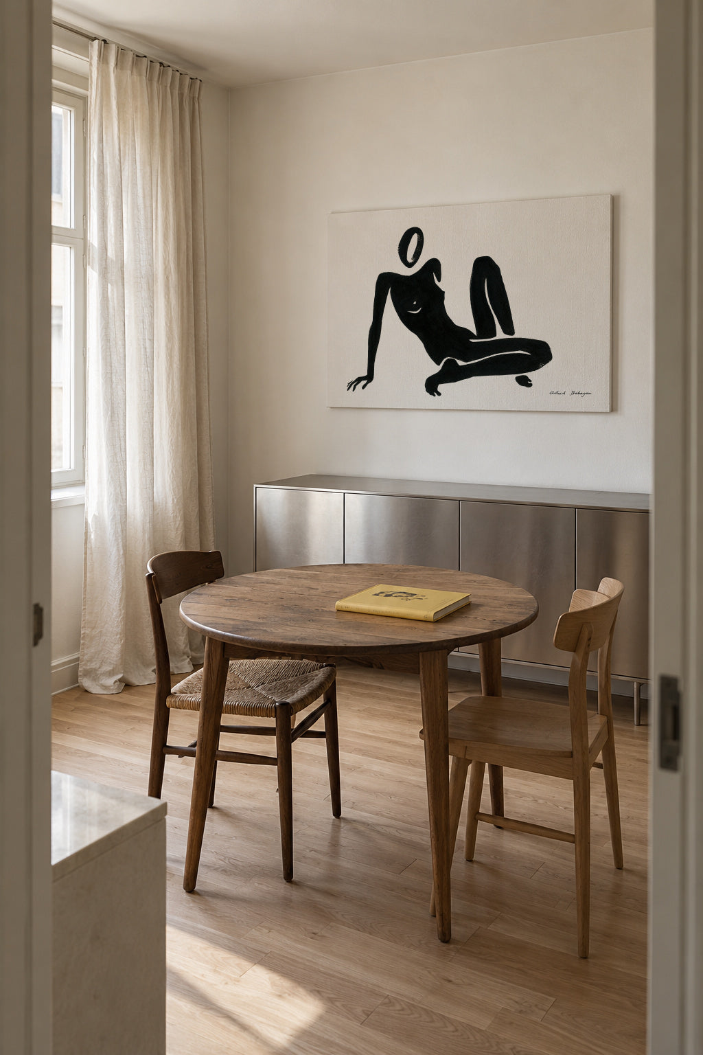 Black figure #3 - Unframed canvas in an interior