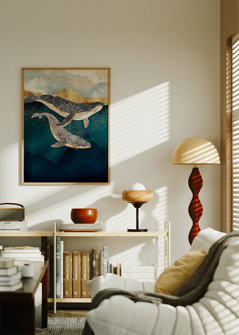Quadro baleias douradas sobre mar azul profundo