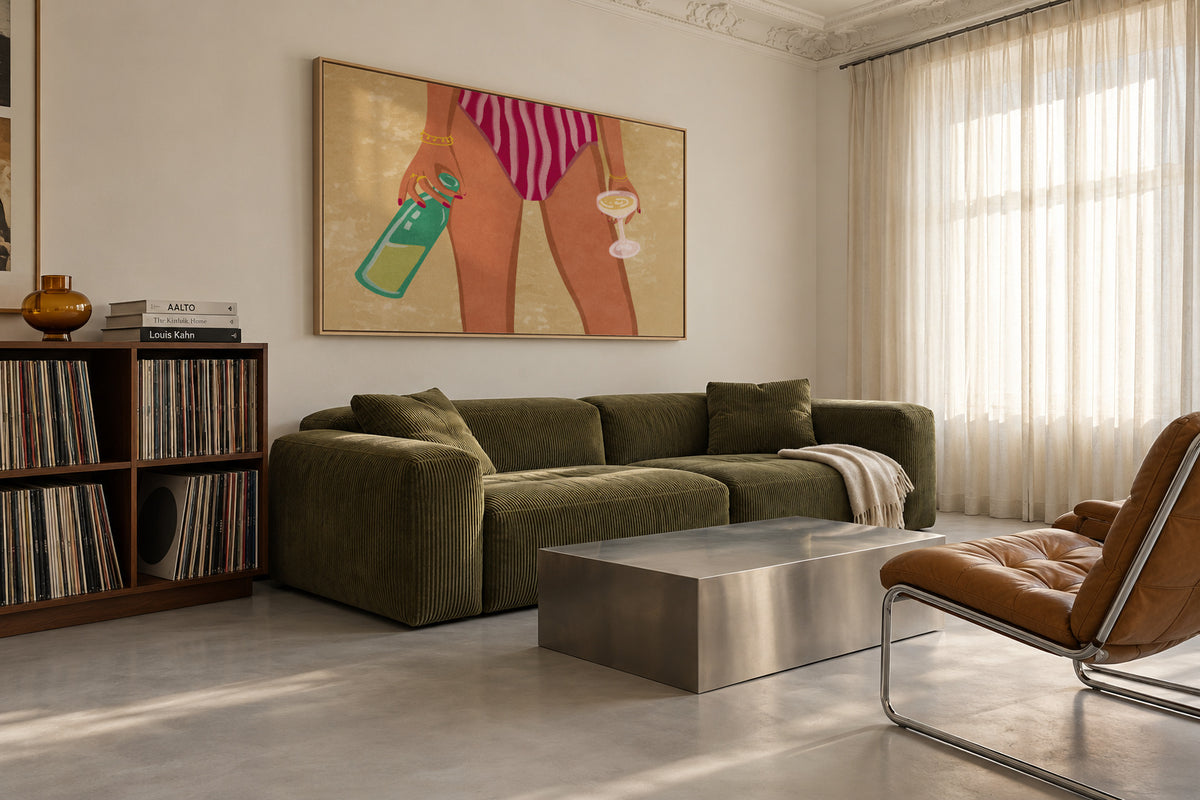 Girl with wine at the beach - Framed canvas in an interior