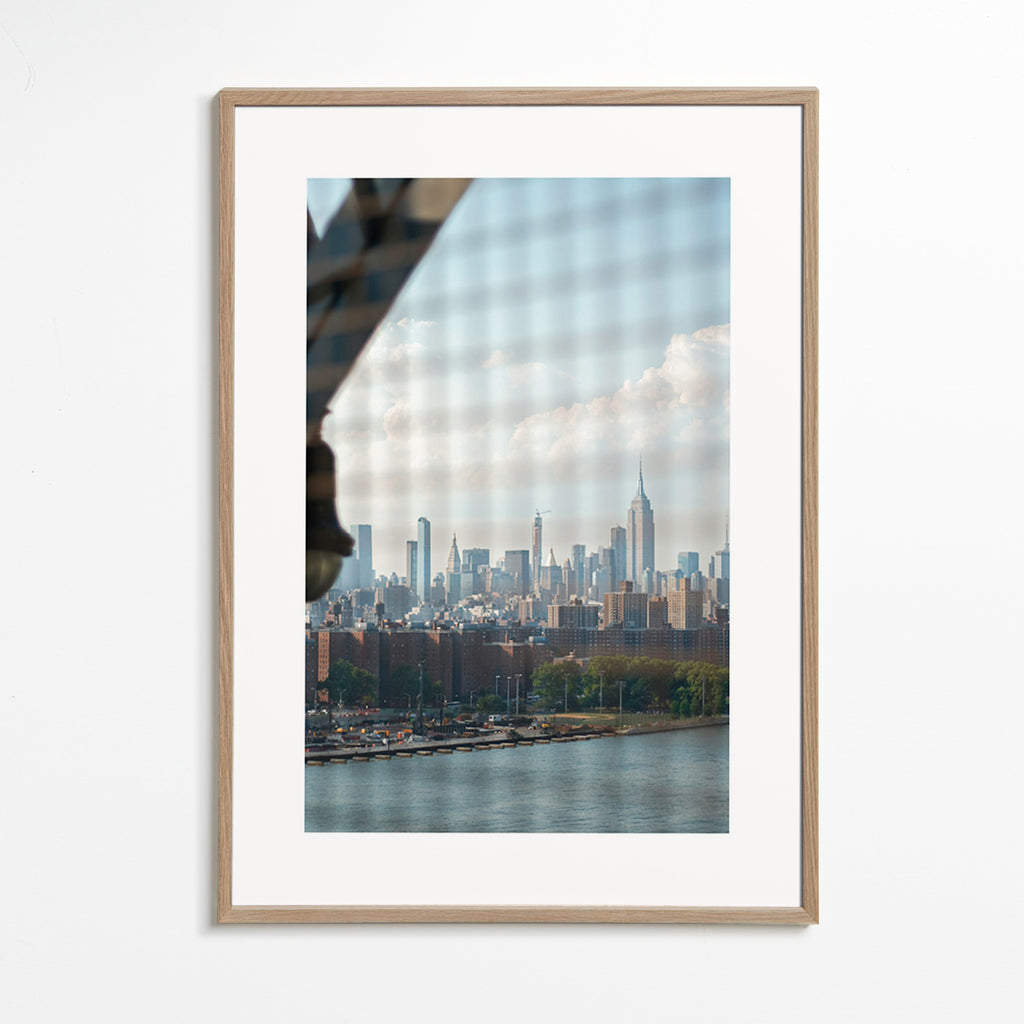 Quadro de cidades com skyline pela janela