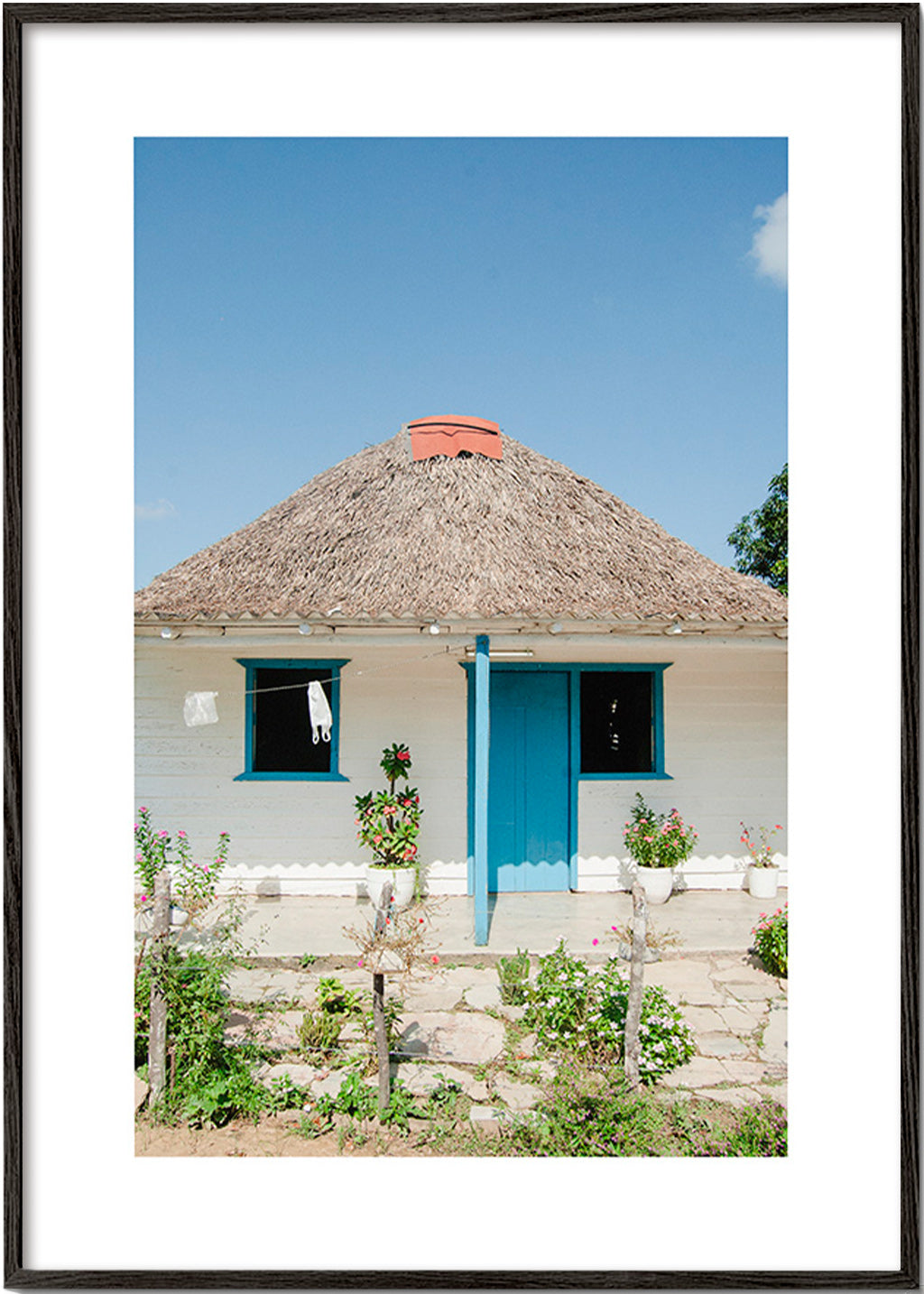 Arte paisagístico: casa com porta azul