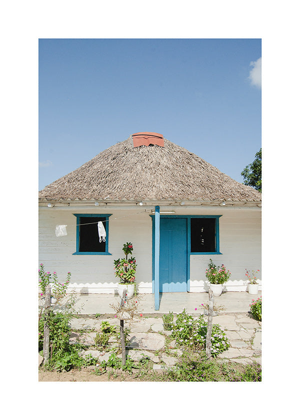 Arte paisagístico: casa com porta azul