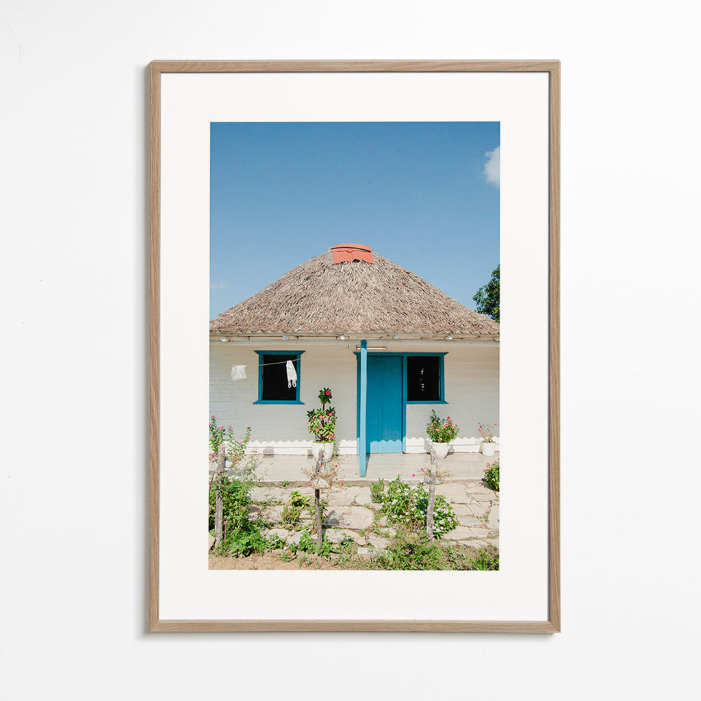 Arte paisagístico: casa com porta azul