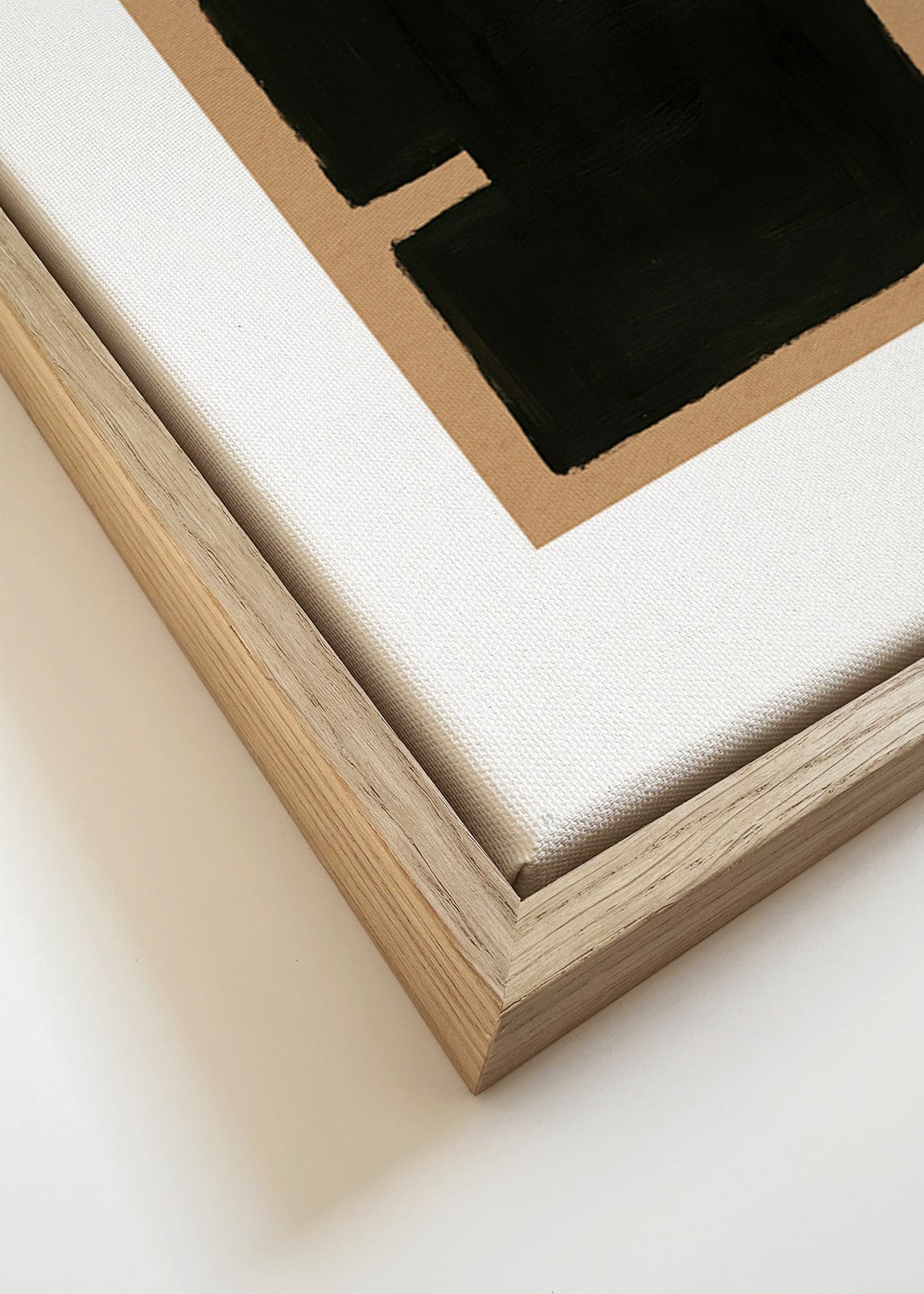 Obra abstracta com blocos negros em papel kraft – Canvas detail