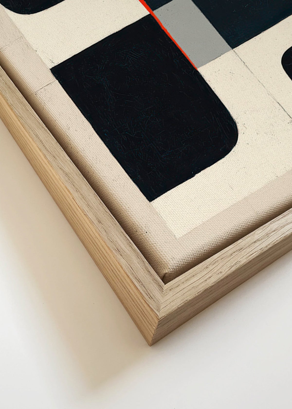 Quadro geométrico com blocos pretos e acento vermelho – Canvas detail