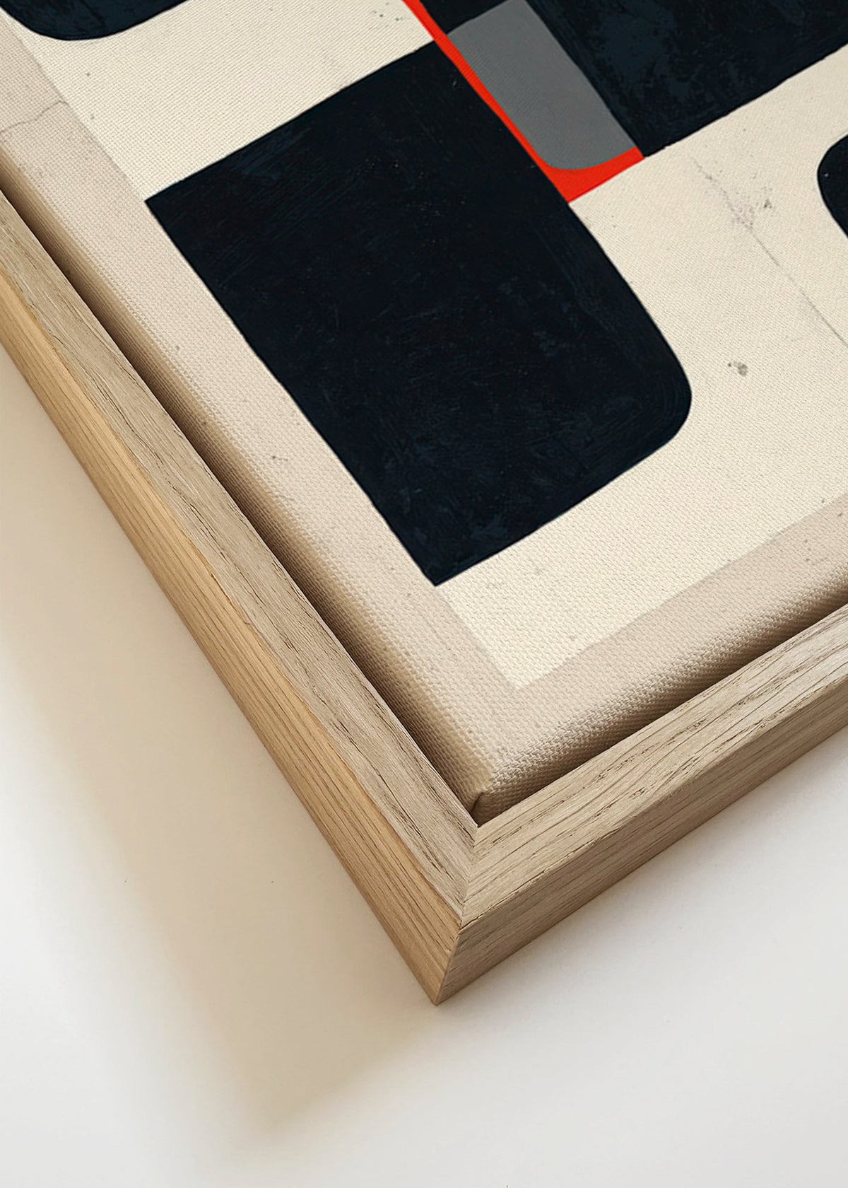 Quadro geométrico com blocos pretos e detalhe vermelho – Canvas detail