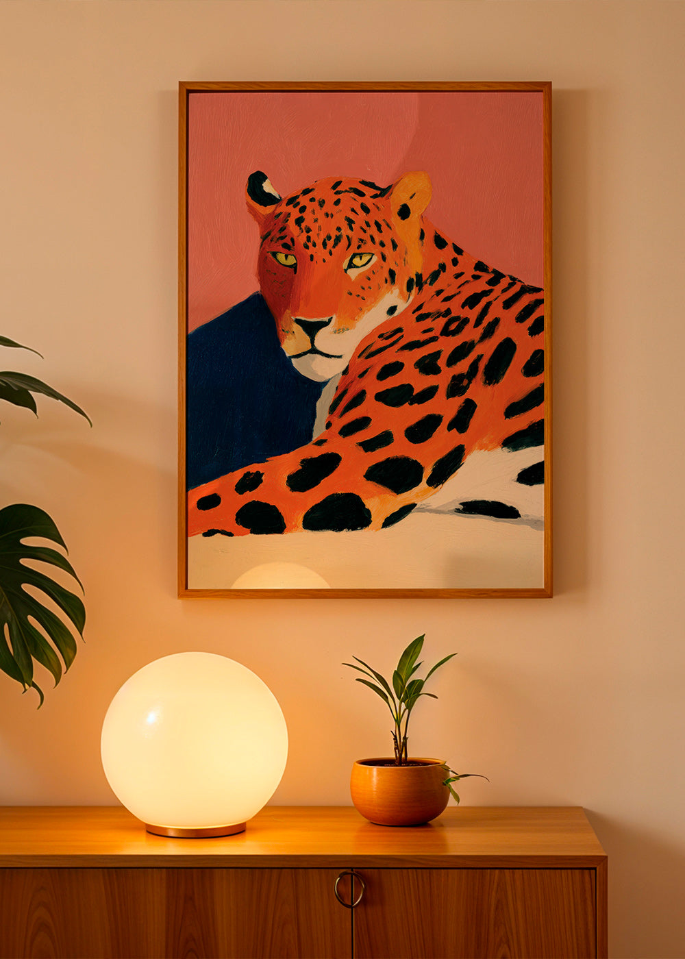 Quadro: Leopardo descansando em fundo rosa