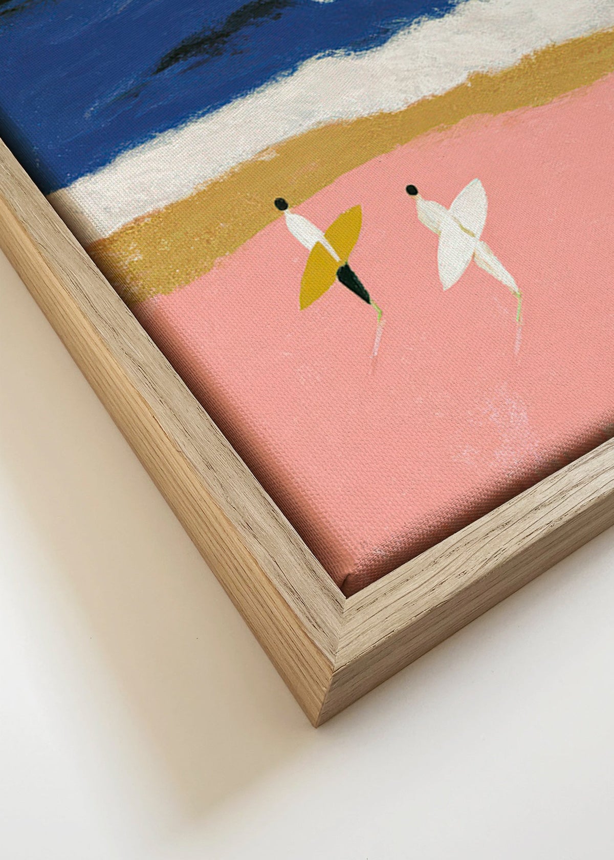 Quadro de paisagem com surfistas e areia rosa