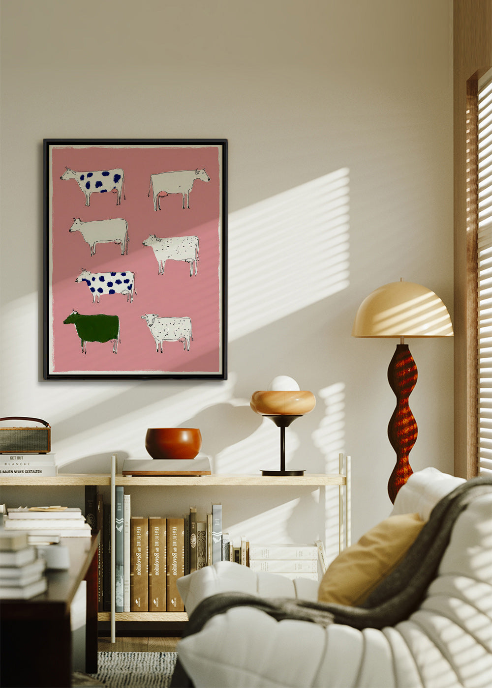Quadro de vacas ilustradas sobre fundo rosa