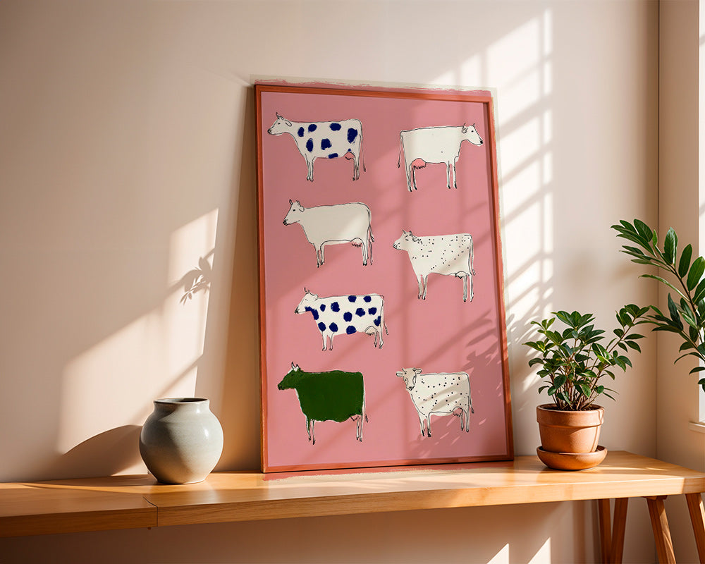 Quadro de vacas ilustradas sobre fundo rosa