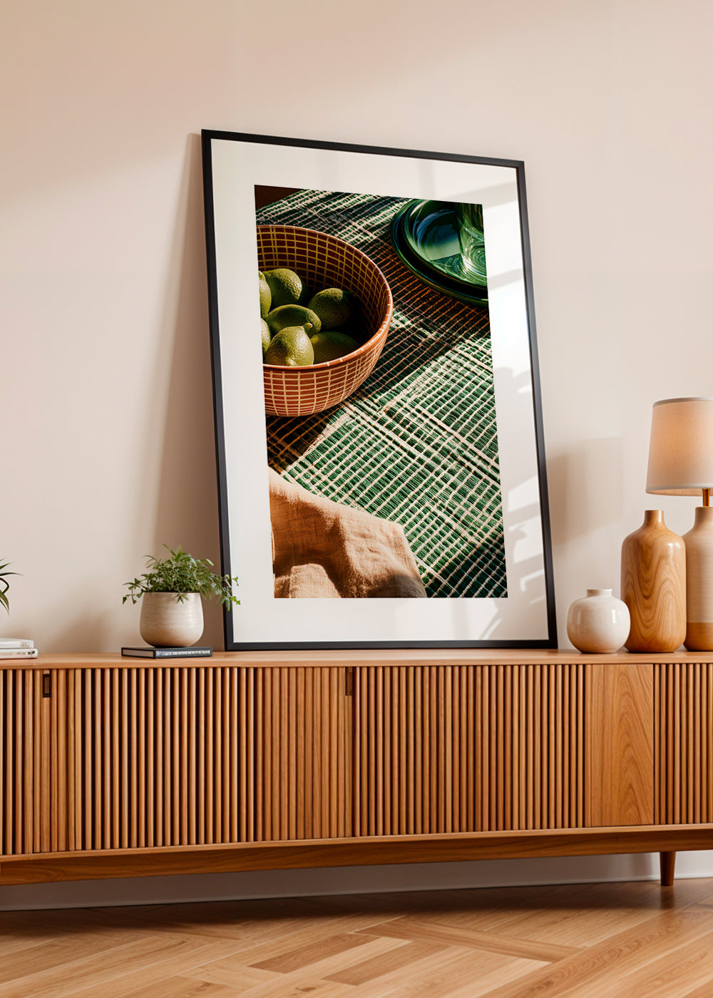Arte para cozinha com limas em tigela e tecido gráfico